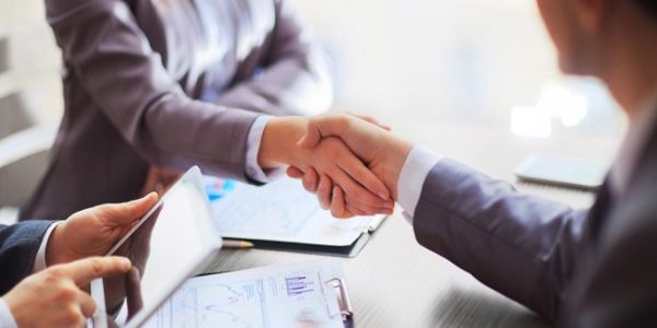 Business people shaking hands